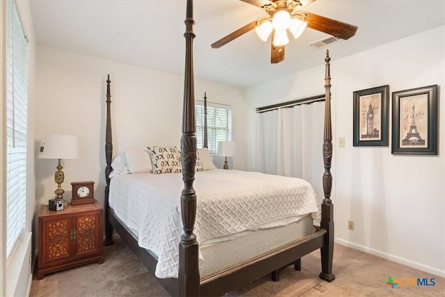 102 Elm Dr, Belton, TX 76513 - bedroom with carpet flooring, baseboards, visible vents, and ceiling fan