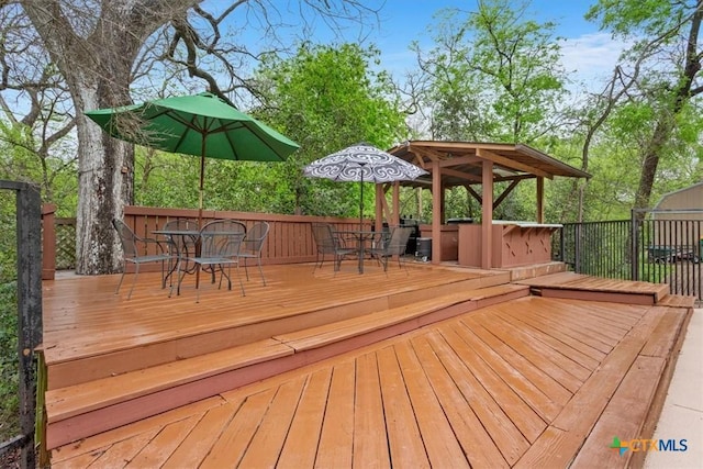 102 Elm Dr, Belton, TX 76513 - wooden deck with outdoor dining space