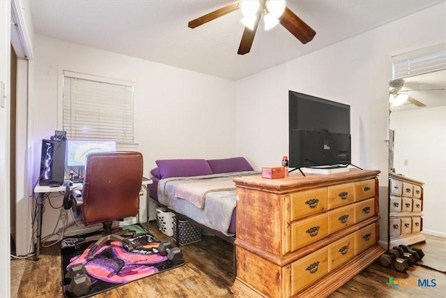 102 Elm Dr, Belton, TX 76513 - bedroom featuring ceiling fan and wood finished floors