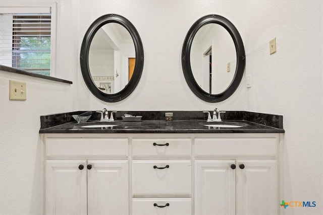 102 Elm Dr, Belton, TX 76513 - bathroom with a sink and double vanity