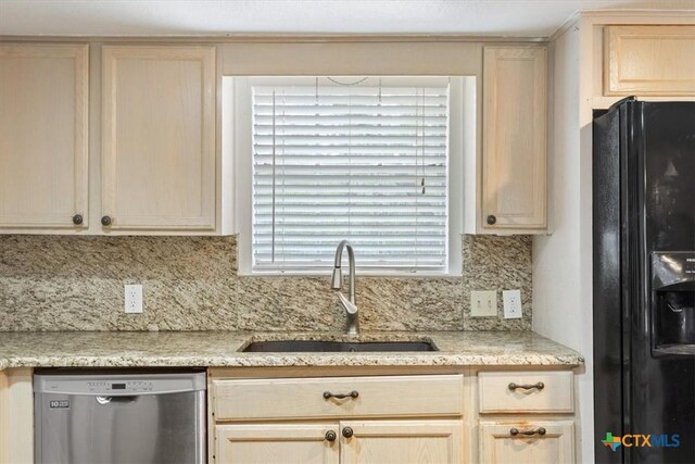 102 Elm Dr, Belton, TX 76513 - kitchen featuring stainless steel dishwasher, a sink, black refrigerator with ice dispenser, and backsplash