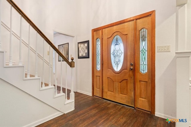 102 Elm Dr, Belton, TX 76513 - foyer entrance with stairs, dark wood-style flooring, baseboards, and a high ceiling