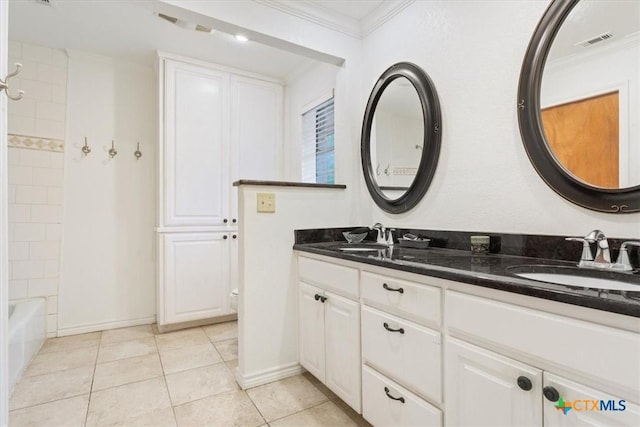 102 Elm Dr, Belton, TX 76513 - full bath featuring visible vents, a sink, tile patterned flooring, and ornamental molding