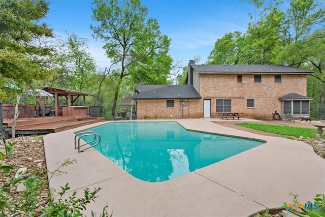 102 Elm Dr, Belton, TX 76513 - outdoor pool with a patio area, a wooden deck, and fence