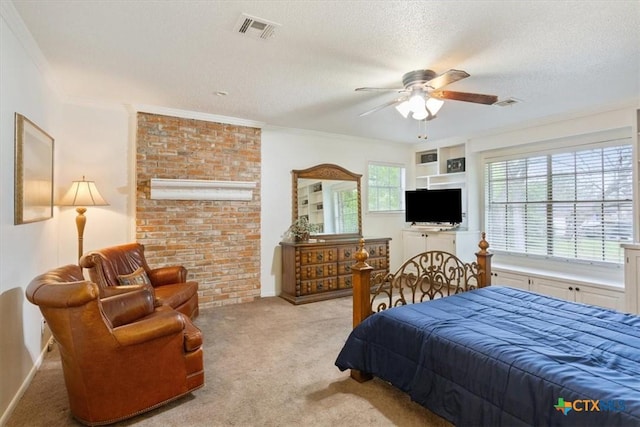 102 Elm Dr, Belton, TX 76513 - bedroom featuring a textured ceiling, visible vents, ornamental molding, and carpet