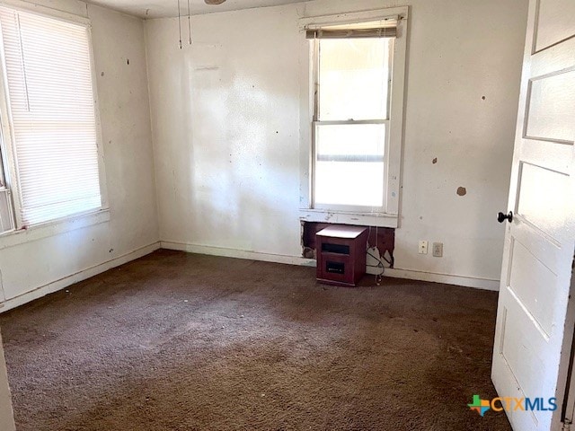 view of carpeted spare room