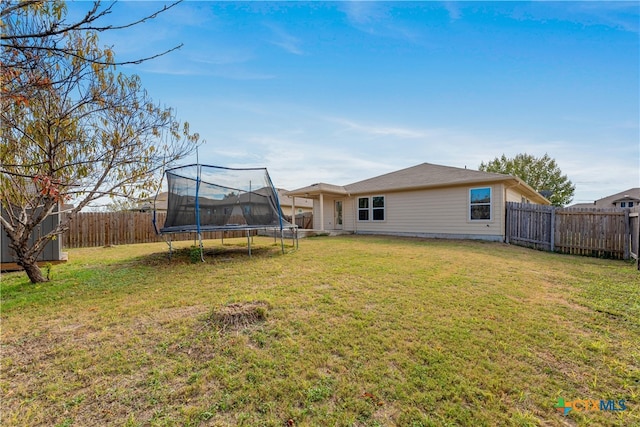 view of yard featuring a trampoline