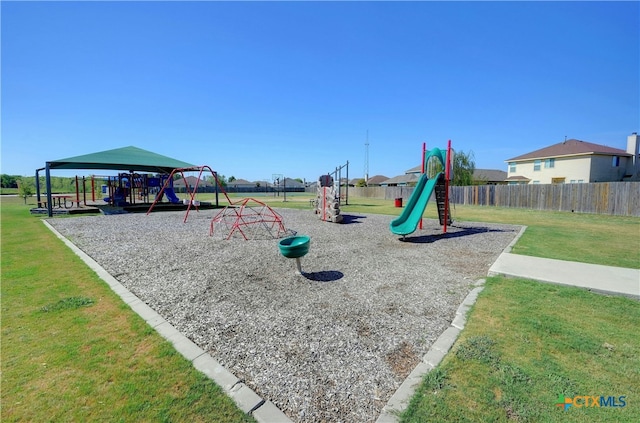 view of play area featuring a lawn