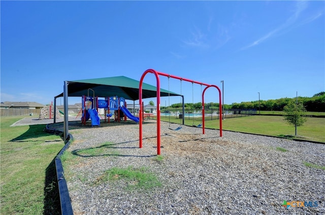 view of play area featuring a lawn