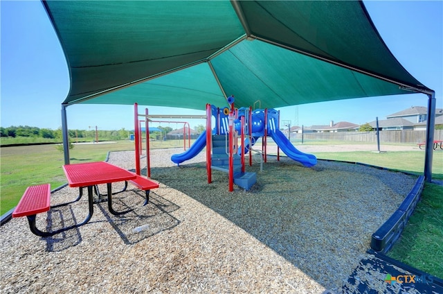 view of jungle gym with a yard