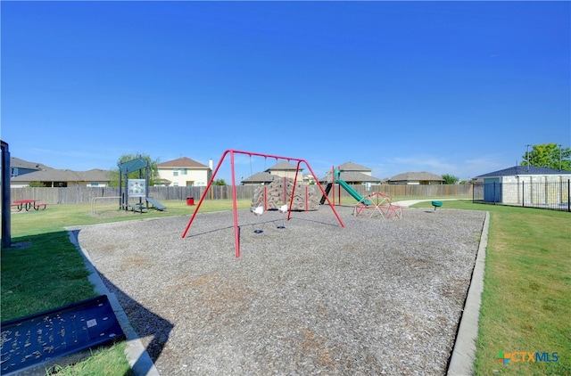 view of playground with a yard