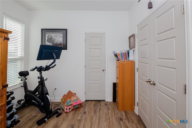 111 Dripping Spg, Victoria, TX 77904 - exercise room with wood finished floors and plenty of natural light