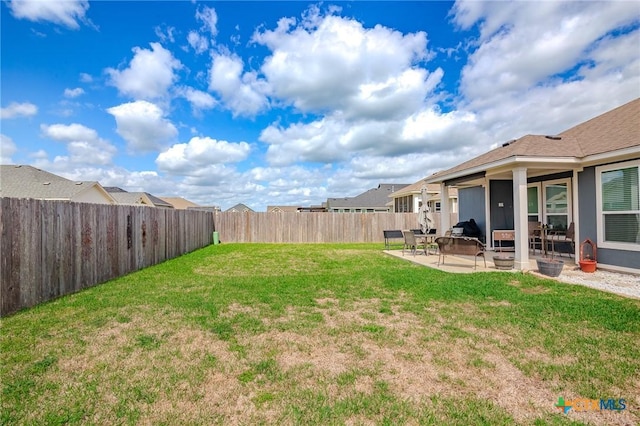 111 Dripping Spg, Victoria, TX 77904 - fenced backyard with a patio area