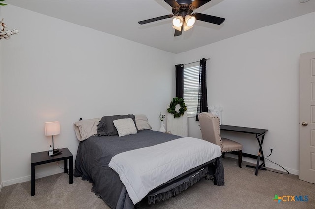 111 Dripping Spg, Victoria, TX 77904 - bedroom with light colored carpet and ceiling fan