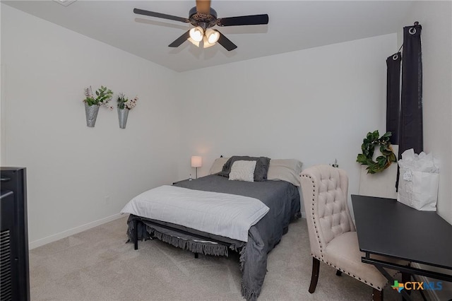 111 Dripping Spg, Victoria, TX 77904 - bedroom featuring light colored carpet and a ceiling fan