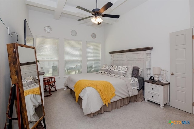111 Dripping Spg, Victoria, TX 77904 - bedroom with light colored carpet, beam ceiling, coffered ceiling, and ceiling fan
