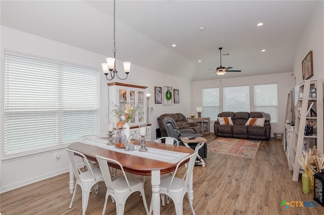 111 Dripping Spg, Victoria, TX 77904 - dining room featuring ceiling fan, light wood-style floors, vaulted ceiling, a chandelier, and recessed lighting