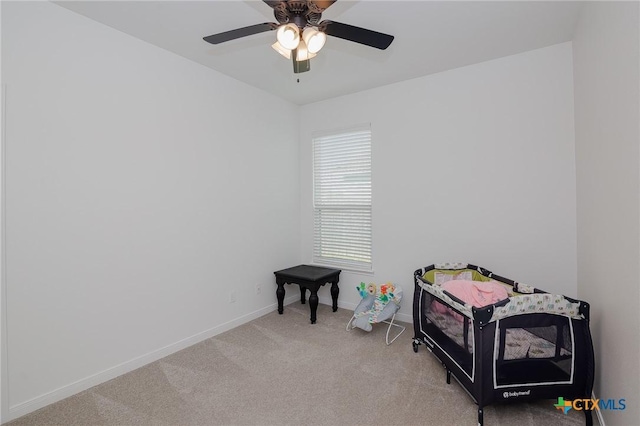 111 Dripping Spg, Victoria, TX 77904 - miscellaneous room with light carpet and ceiling fan