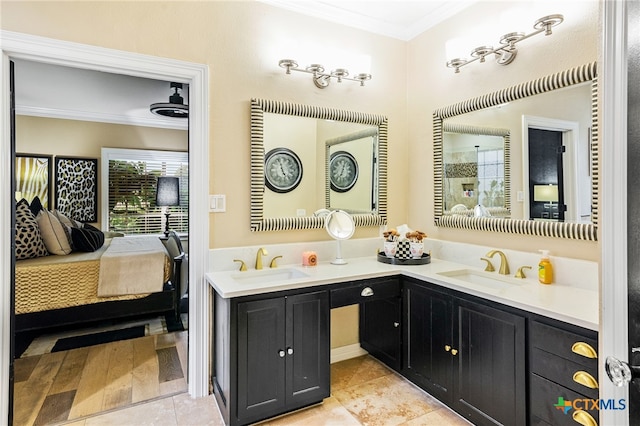 bathroom with vanity and crown molding