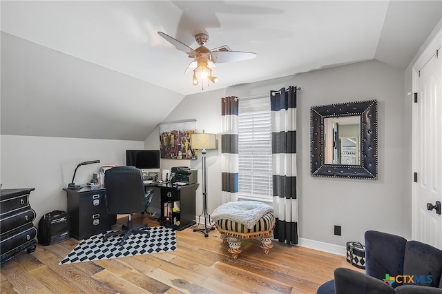 home office with hardwood / wood-style flooring, ceiling fan, and lofted ceiling