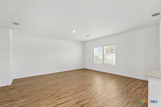 empty room featuring light hardwood / wood-style floors