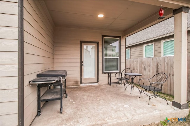 doorway to property featuring a patio area