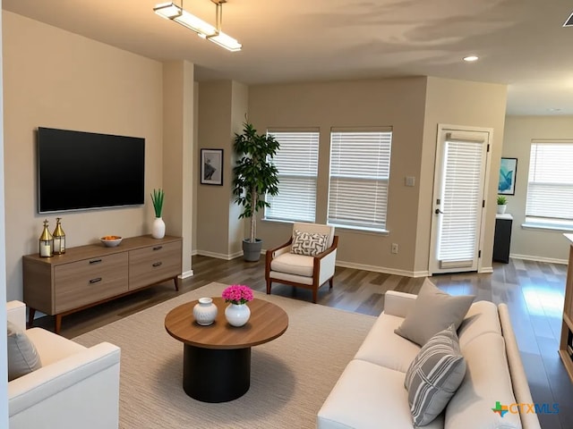 2411 Pintail Loop, Copperas Cove, TX 76522 - living area featuring wood finished floors, recessed lighting, and baseboards