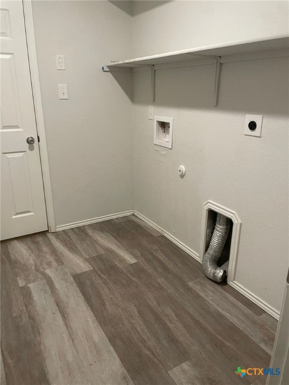2411 Pintail Loop, Copperas Cove, TX 76522 - washroom featuring dark wood finished floors, hookup for a washing machine, baseboards, and hookup for an electric dryer