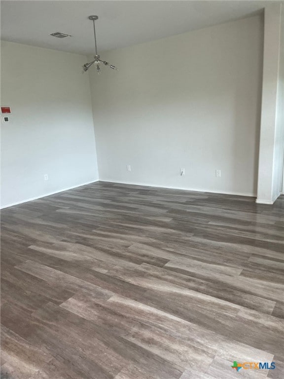 2411 Pintail Loop, Copperas Cove, TX 76522 - unfurnished room with dark wood-style floors and baseboards