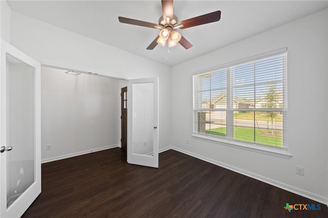 619 Killam Dr, Temple, TX 76502 - unfurnished bedroom with wood finished floors, baseboards, lofted ceiling, and ceiling fan
