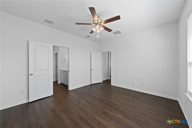 619 Killam Dr, Temple, TX 76502 - unfurnished bedroom featuring dark wood-style flooring, baseboards, and ceiling fan