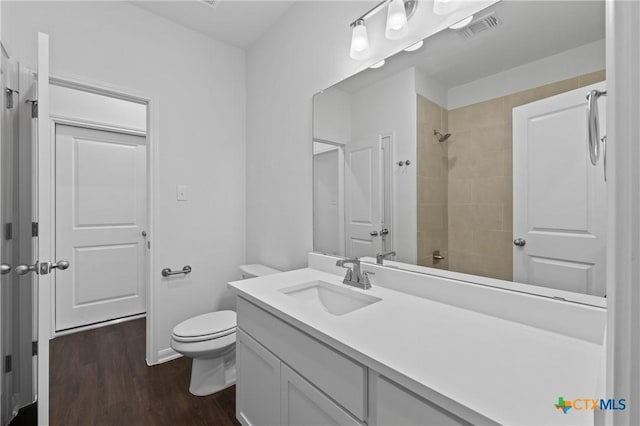 619 Killam Dr, Temple, TX 76502 - full bath featuring wood finished floors, a shower, toilet, and vanity