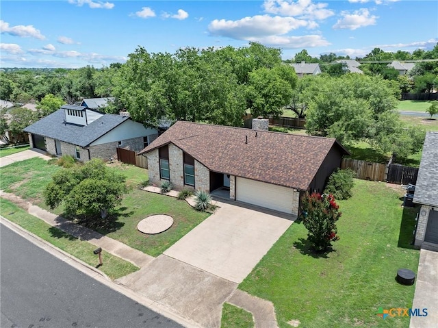 907 Great Oaks Cv, Round Rock, TX 78681 - view of front of property with a shingled roof, a garage, and concrete driveway