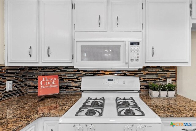 907 Great Oaks Cv, Round Rock, TX 78681 - kitchen view of white appliances, white cabinets, and decorative backsplash
