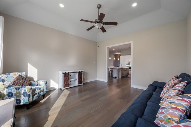 916 Dream Catcher Dr, Leander, TX 78641 - living area featuring dark wood finished floors, ceiling fan, recessed lighting, and baseboards