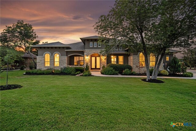 916 Dream Catcher Dr, Leander, TX 78641 - view of front of home featuring stone siding and a front lawn
