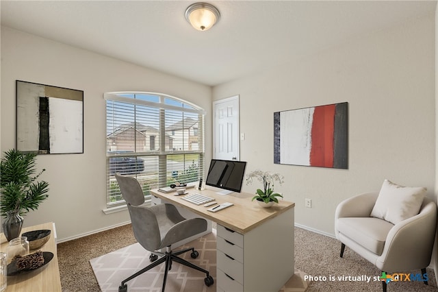 view of carpeted home office