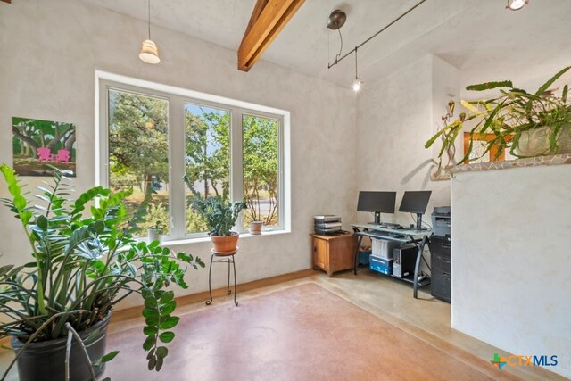 office area with concrete flooring