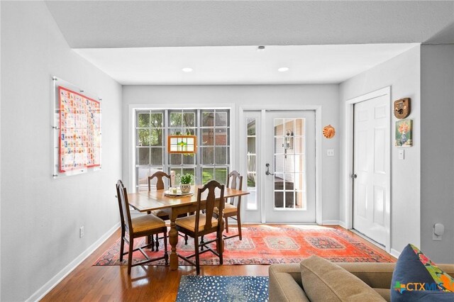 407 Pasadena Dr, Victoria, TX 77904 - dining room with baseboards, wood finished floors, french doors, and recessed lighting