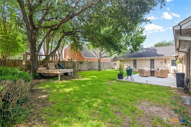 407 Pasadena Dr, Victoria, TX 77904 - view of yard with an outdoor hangout area, a patio, and a playground