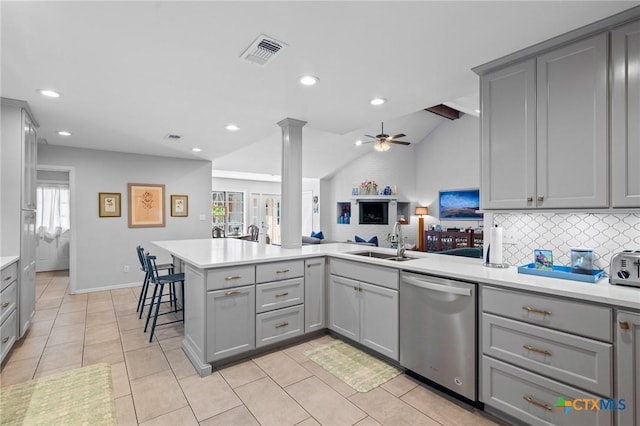 407 Pasadena Dr, Victoria, TX 77904 - kitchen featuring gray cabinetry, dishwasher, a sink, lofted ceiling, and recessed lighting