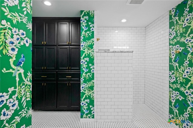 407 Pasadena Dr, Victoria, TX 77904 - bathroom with tiled shower and recessed lighting