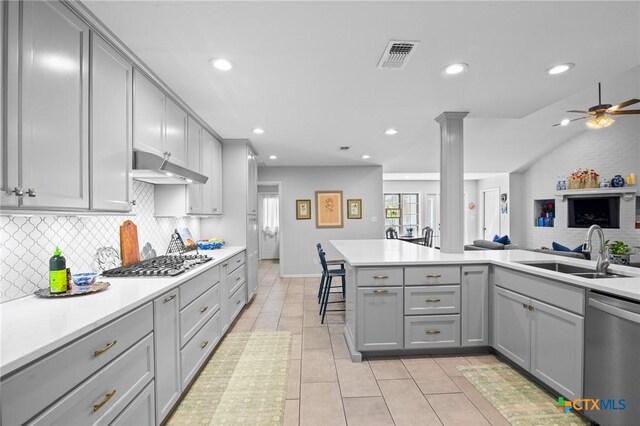 407 Pasadena Dr, Victoria, TX 77904 - kitchen with gray cabinets, dishwasher, a sink, gas cooktop, and recessed lighting