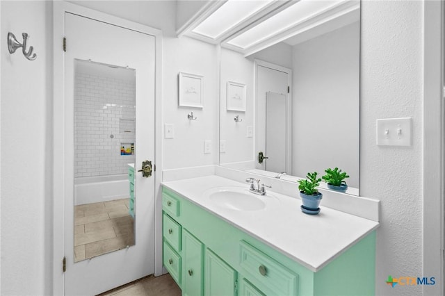 407 Pasadena Dr, Victoria, TX 77904 - bathroom featuring vanity, a tub, and a shower