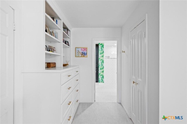 407 Pasadena Dr, Victoria, TX 77904 - walk in closet featuring light colored carpet