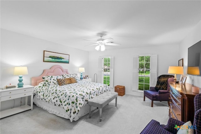 407 Pasadena Dr, Victoria, TX 77904 - bedroom with light carpet and ceiling fan