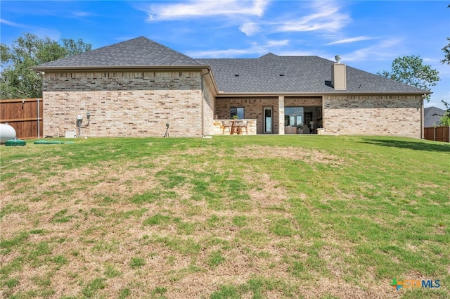 1586 Bosque Lago Dr, Belton, TX 76513 - back of property with brick siding and a shingled roof