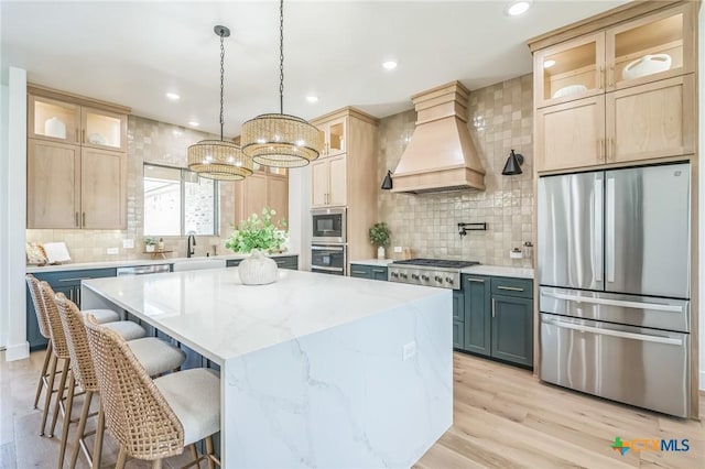1586 Bosque Lago Dr, Belton, TX 76513 - kitchen featuring appliances with stainless steel finishes, custom exhaust hood, backsplash, a center island, and recessed lighting