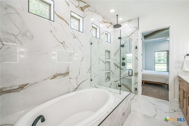 1586 Bosque Lago Dr, Belton, TX 76513 - ensuite bathroom featuring a marble finish shower, a garden tub, vanity, and marble tiled floors
