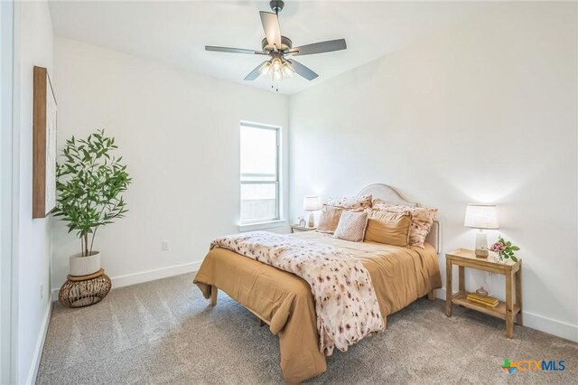 1586 Bosque Lago Dr, Belton, TX 76513 - bedroom with carpet floors, baseboards, and ceiling fan